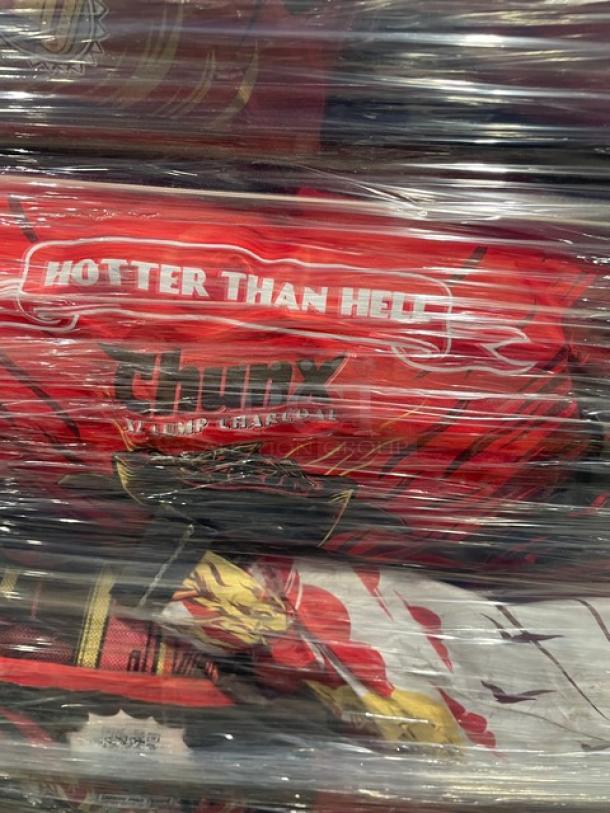 Full pallet of Jealous Devil 35 lb. hardwood lump charcoal, "Hotter Than Hell" label, brand new condition.