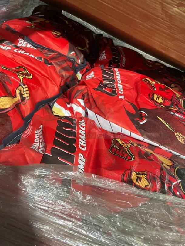Brand new full pallet of Jealous Devil 35 lb. all-natural hardwood lump charcoal bags, vibrant red packaging.