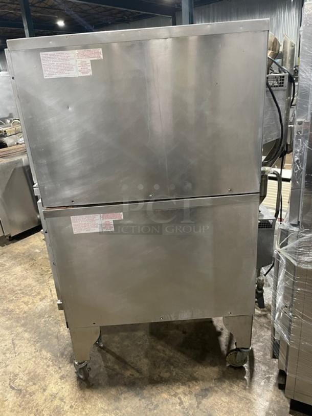 Blodgett HydroVection Series double stacked stainless steel convection oven, model HV100G/AA, on casters with wired oven rack.