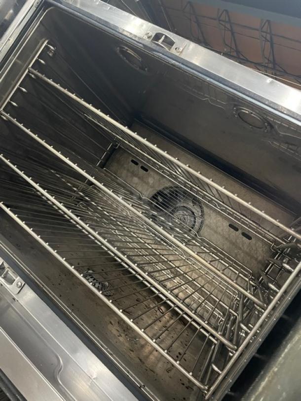 Blodgett HV100G/AA natural gas convection oven, double stacked, stainless steel, includes wired rack, on casters.