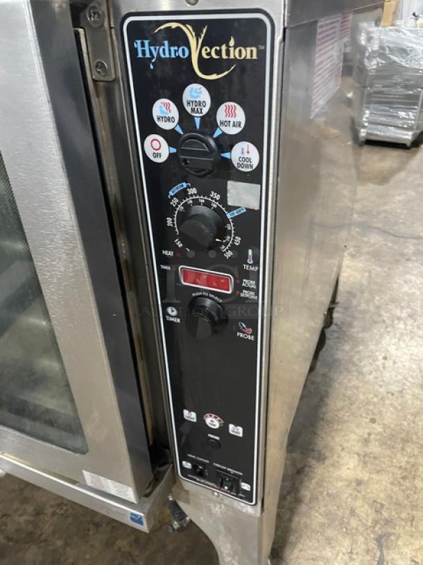Blodgett HydroVection HV100G/AA commercial convection oven, stainless steel, natural gas. Features wired oven rack, control panel, on castors.