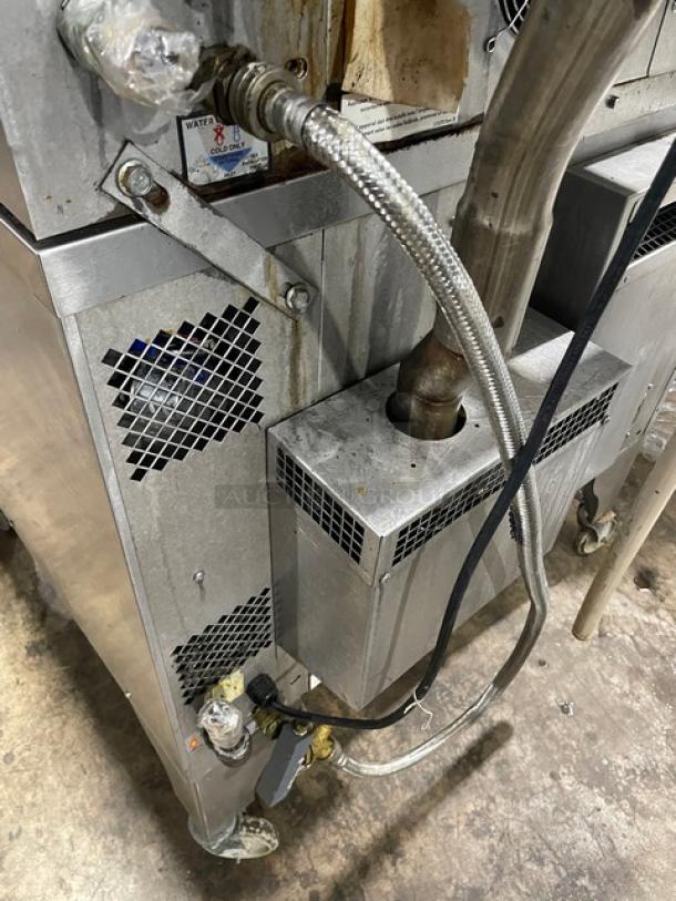 Blodgett HV100G/AA HydroVection Series stainless steel convection oven, natural gas powered, with wired oven rack, on casters.