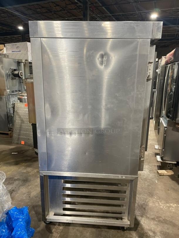 Baxter OV300G stainless steel natural gas convection oven, features digital control, 8-pan rotating rack, and caster wheels.