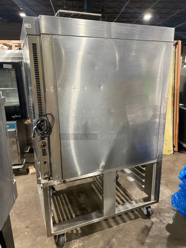 Baxter OV300G stainless steel gas convection oven with digital control, 8-pan rotating rack, and open-base stand, on casters.