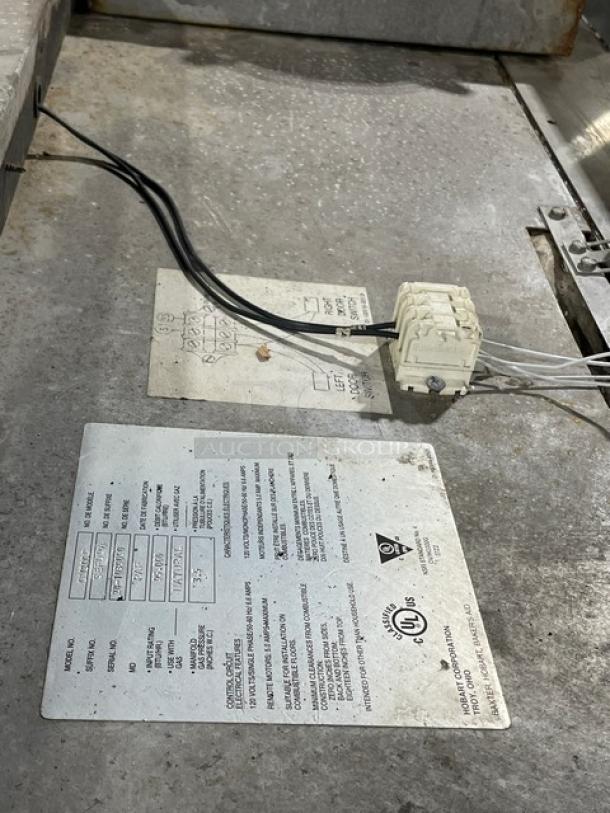 Baxter OV300G stainless steel natural gas convection oven, with digital control and 8-pan rotating rack, on casters.