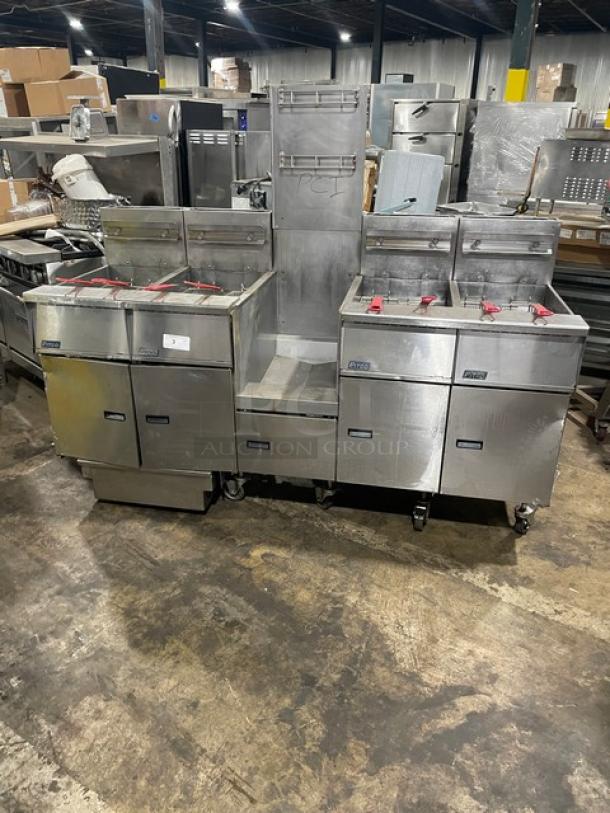 Pitco FG-SGH50 4-bay 50 lb. stainless steel gas fryer, center basket hanger, backsplash, casters; used, good condition.