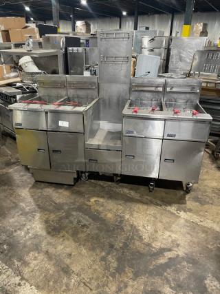 Pitco FG-SGH50 4-bay 50 lb. stainless steel gas fryer, center basket hanger, backsplash, casters; used, good condition.