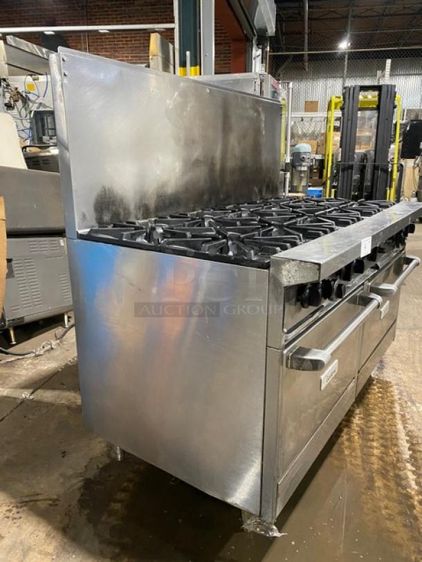 Garland commercial stainless steel 10-burner range with double oven, backsplash, and wired oven rack. Natural gas powered.