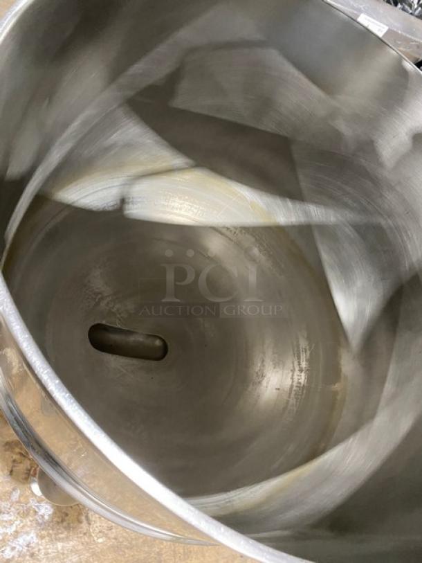 Groen FT80 stainless steel steam kettle, 80-gallon capacity, natural gas-powered, on legs. Serial: 72285. In good condition.