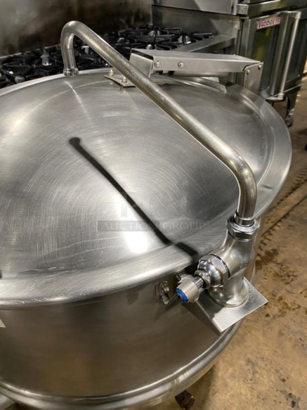 Groen FT80 commercial stainless steel steam kettle, 80 gal., natural gas powered, on legs, serial number 72285, clean condition.