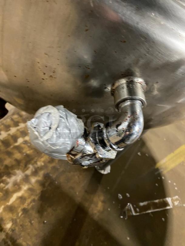 Groen FT-80 commercial 80-gal steam kettle, stainless steel, natural gas, on legs. SN: 72285. Visible wear, taped pipe.