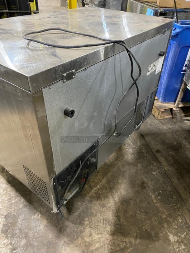 Bison BUR48 stainless steel 2-door undercounter worktop refrigerator, model BUR-48. Features casters, 115V 1 phase, signs of use.