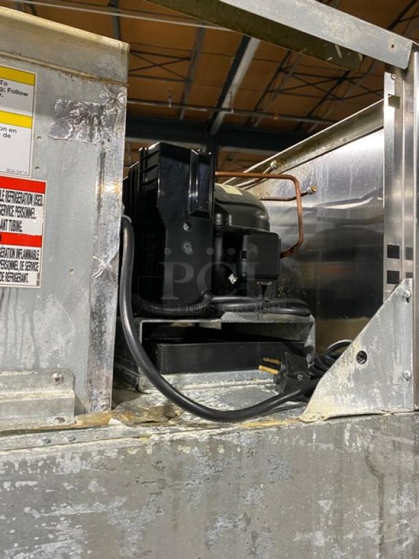 Victory UltraSpec Commercial Freezer FS-1D-S1-EWHDHC18RC, electric, stainless steel, 2 half doors, visible wiring, moderate wear.