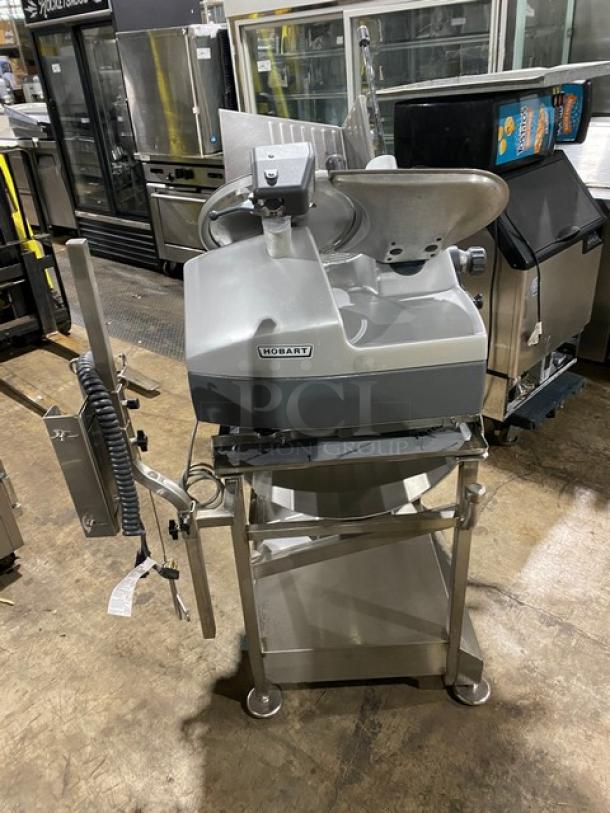 Hobart 2912 commercial stainless steel electric meat slicer on new stand; excellent condition, 120V, 1 phase.