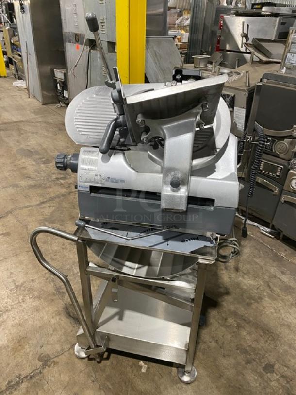 Hobart Model 2912 stainless steel electric meat slicer with new stand, 120V, 1 Phase, Serial No. 561-183-521. Excellent condition.