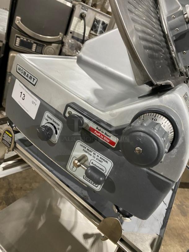 Hobart Model 2912 commercial meat slicer on new stand, electric, 120V 1 Phase, stainless steel, excellent condition.