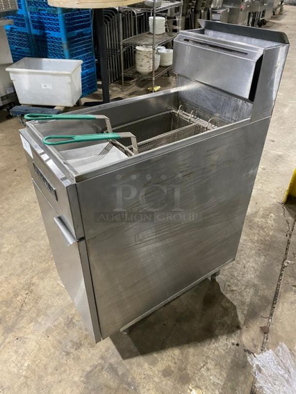 American Range stainless steel natural gas deep fat fryer with back splash, basket hanger, fry basket, and legs.