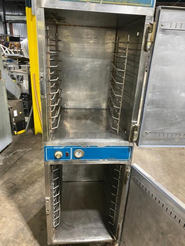 Alto-Shaam stainless steel cook & hold oven, model 1000-41P, full-height, dual half doors, on casters, built-in pan slides.