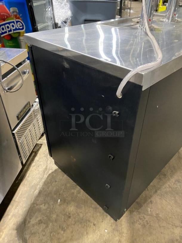 Micro Matic MDD-78 kegerator with 3 black doors, dual tap towers, model SN: 14090939M, 115V, 1 phase, on casters.