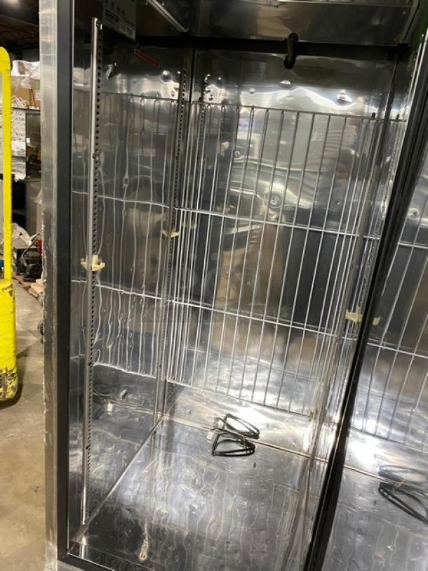 Turbo Air TSF-23SD stainless steel single door freezer, poly coated wired rack, serial DF23505021, 115V, on casters.