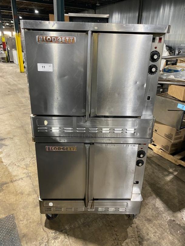 Blodgett stainless steel double-stacked gas convection oven, thermostatic controls, wired rack, on casters, excellent condition.