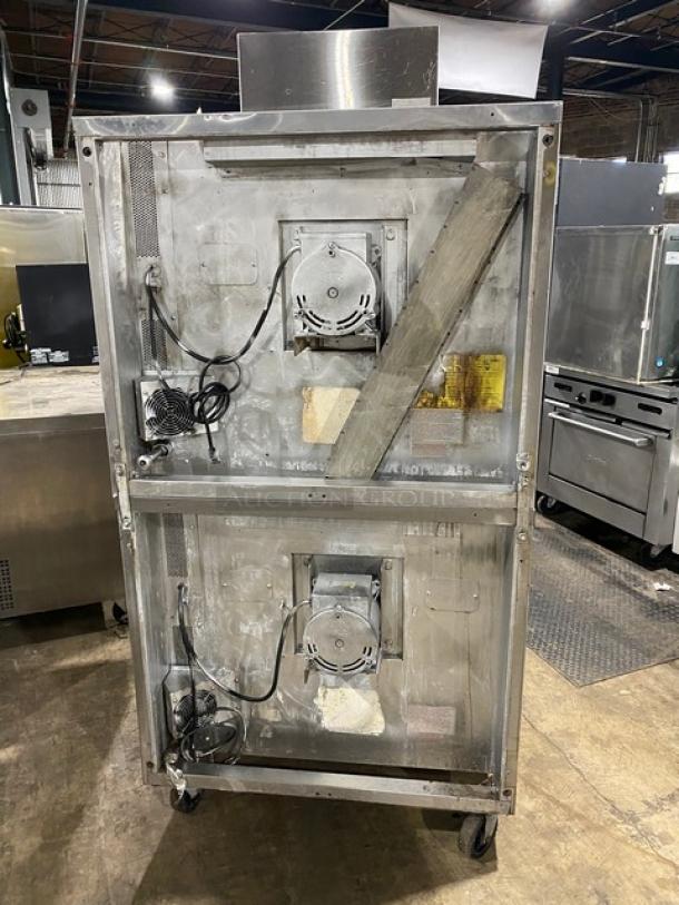Blodgett stainless steel double-stacked gas convection oven, thermostatic controls, wired rack, on casters, used condition.