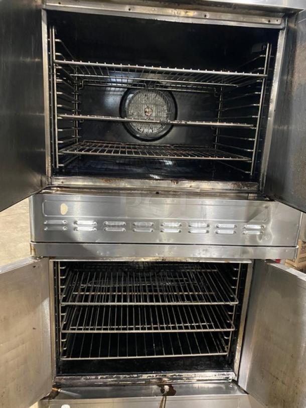 Blodgett commercial double-stacked stainless steel gas convection oven, thermostatic controls, wired racks, on casters.