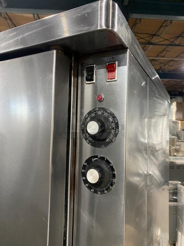 Blodgett stainless steel gas convection oven, double stacked, thermostatic controls, wired rack, on casters, excellent condition.