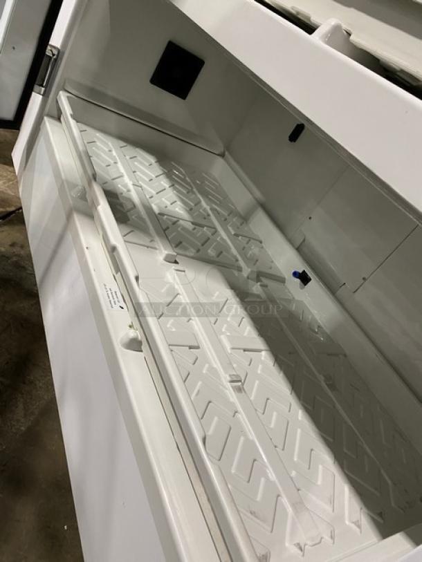 Urban Cultivator Commercial white indoor garden, Model 001, electric, double glass doors, on casters, clean interior.