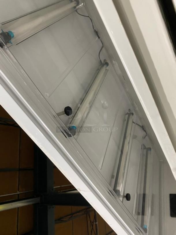 Urban Cultivator Commercial 001 indoor garden with double glass doors, suitable for herbs, microgreens, and vegetables. Features electric power, 120V, on casters.