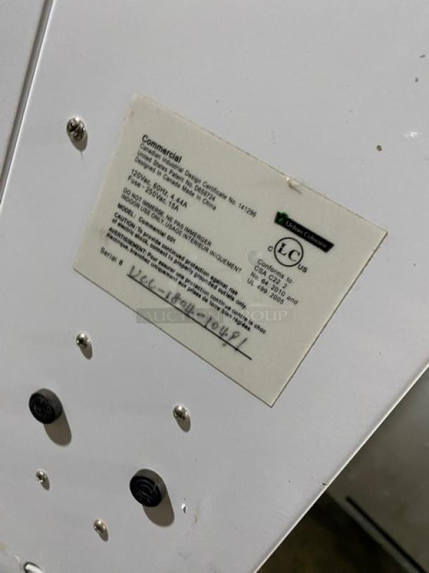 Urban Cultivator Commercial indoor garden with double glass doors. Model Commercial 001, SN: VCC-1804-104P1, 120V, on casters.