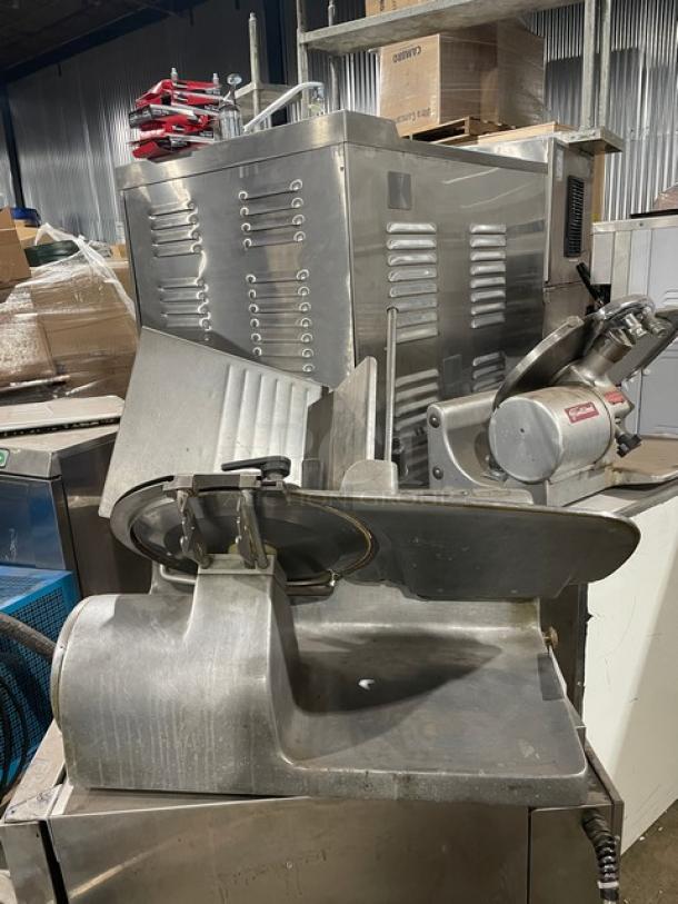 Hobart 1612E commercial electric deli meat slicer, 115V, 1 phase. Used condition, visible controls and blade.