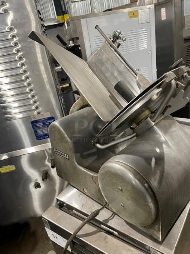 Hobart 1612E commercial electric deli meat slicer, stainless steel, countertop model, 115V, 1-phase, used condition.