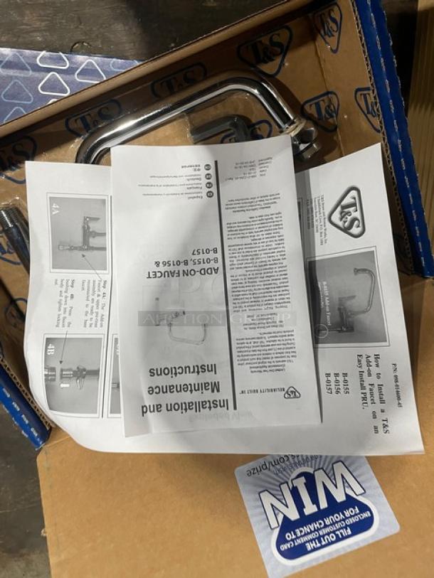 Brand new T&S chrome plated add-on faucet in original packaging with instruction manuals; model B-0157 shown.