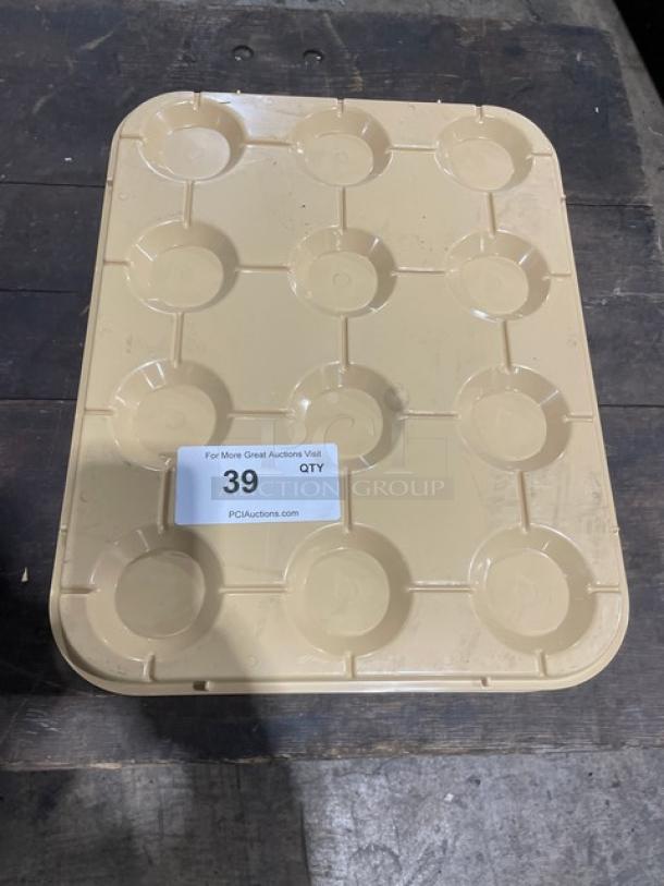 NEW Cambro KK1200 beige 12-compartment cup stacker/glass keeper, pristine condition, numbered tag "39" visible.