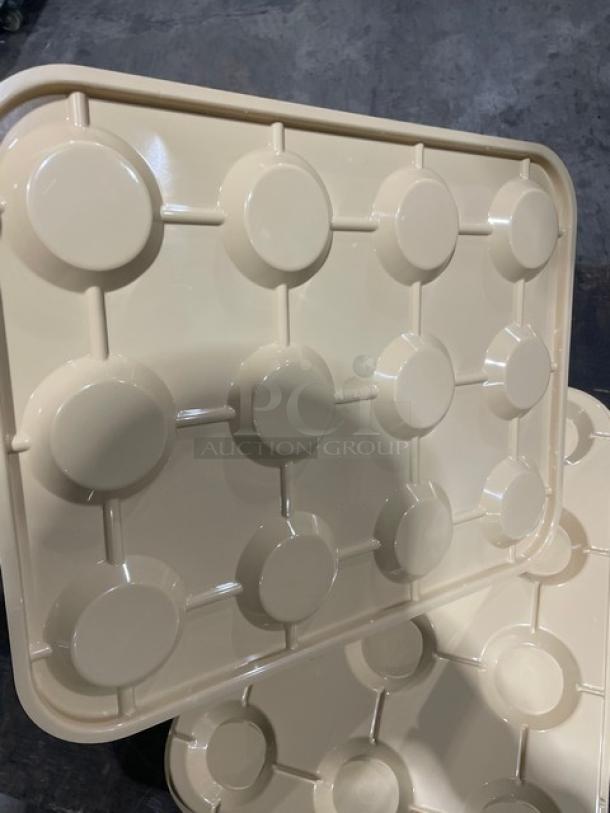 NEW Cambro KK1200 beige 12-compartment cup stacker/glass keeper, commercial grade, pristine condition, durable material.