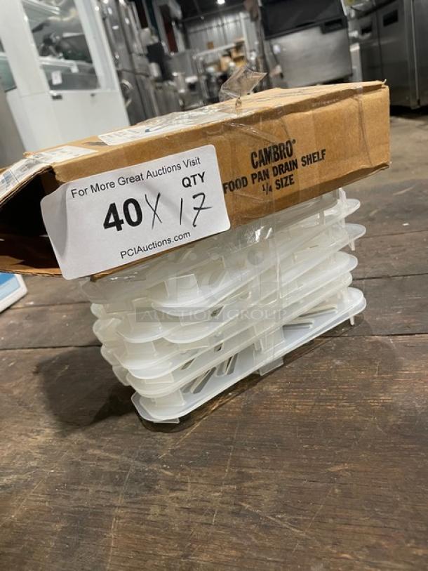 Cambro 40PPD190 food pan drain shelf in translucent polypropylene, 1/4-size, scratch-resistant, new condition, boxed.