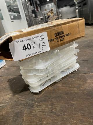 Cambro 40PPD190 food pan drain shelf in translucent polypropylene, 1/4-size, scratch-resistant, new condition, boxed.