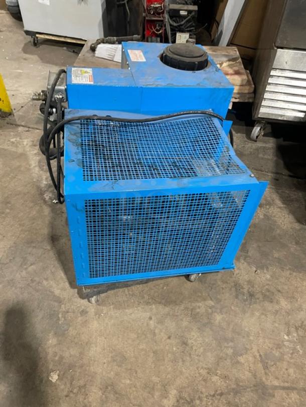 Banner Perfecta Pour Cold-Blast Series Model 60835A in used condition. Electric powered, air-cooled blast chill power pack. 115V, 1 phase. Visible wear.