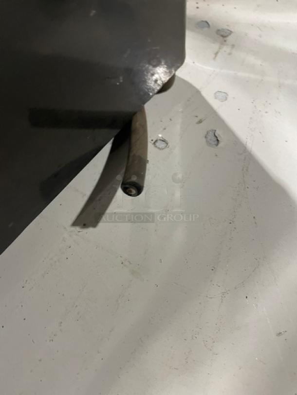 Cunill commercial electric coffee grinder, countertop model. Serial No: 845239. Used condition, visible wear marks.