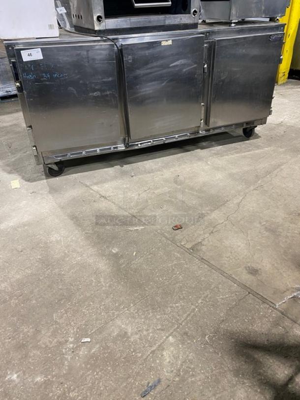 Beverage-Air 3-door stainless steel undercounter refrigerator, model UCR72A, with wired rack and casters, 115V, in used condition.