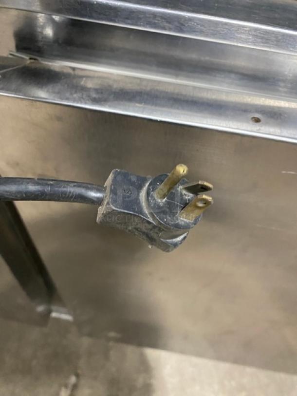 Beverage-Air UCR72A stainless steel 3-door undercounter refrigerator, poly coated wire rack, 115V, 1 phase, on casters.