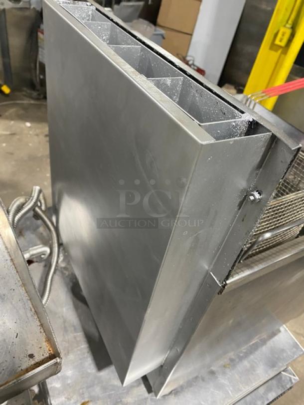 Cecilware commercial stainless steel natural gas countertop deep fat fryer with backsplash, frying basket, and legs, SN: 054821.