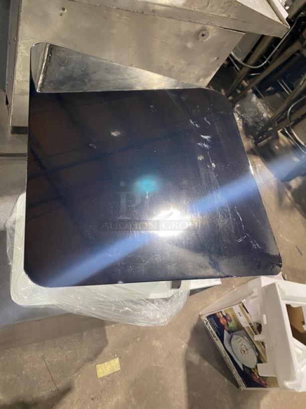 Adcraft SCA-100 scale, new condition, with 13.5" stainless steel platform. Dial type, 100 lb capacity, SN: J1310274974.