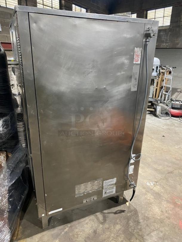 Alto-Shaam Combitherm 20.20ESG commercial stainless steel combi oven, natural gas powered, with wired rack, on legs.