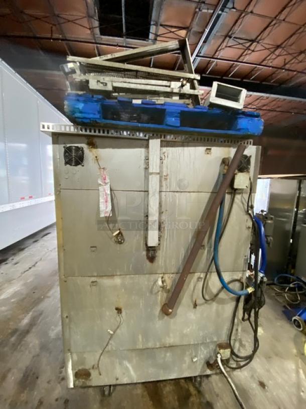Middleby Marshall PS360S stainless steel double-stacked conveyor pizza oven in used condition, on casters, natural gas powered.