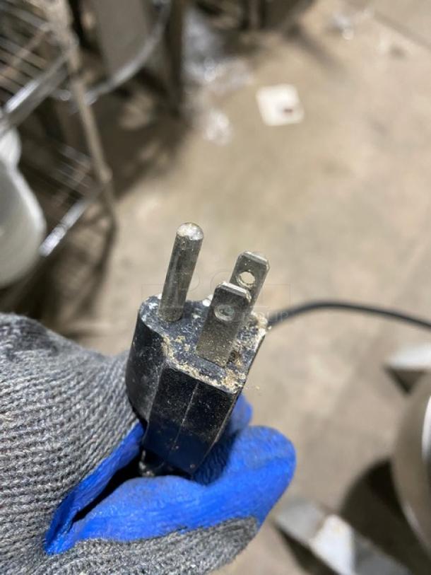 Electric plug of General GEM130 planetary mixer, 110V, showing standard three-prong design.