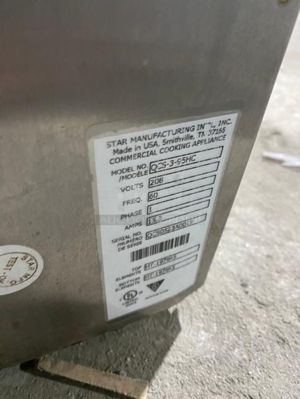 Star QCS Series stainless steel electric countertop conveyor toaster, model QCS395HC, 208V, 1 phase, on legs.