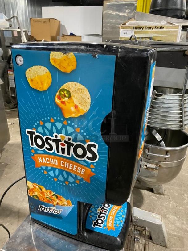 Gold Medal 5300P Tostitos nacho cheese dispenser, black, electric-powered, countertop model, push-button control, 120V.