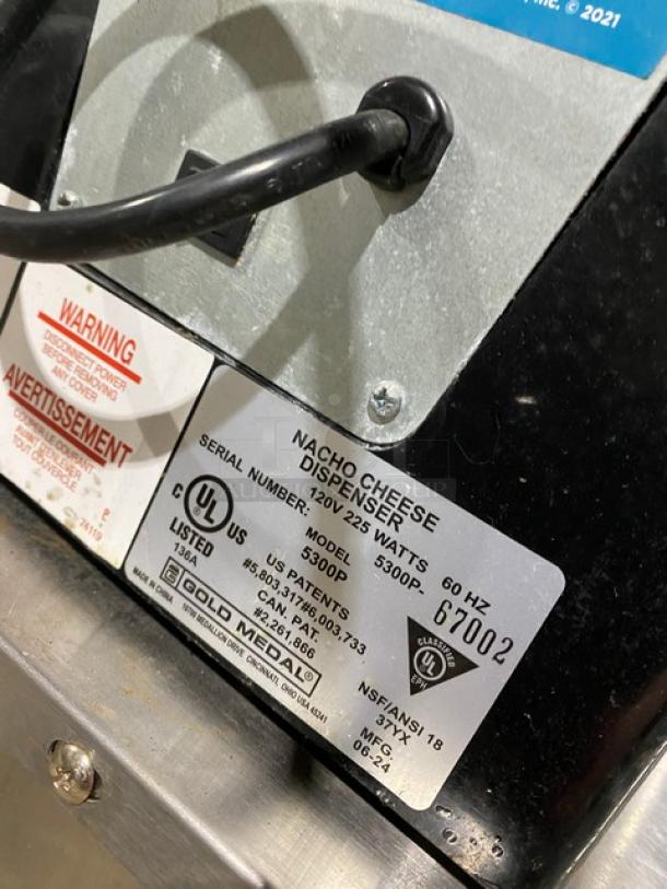 Gold Medal 5300P Nacho Cheese Dispenser, black, electric, push-button, 120V, SN: 5300P-67002, UL listed.